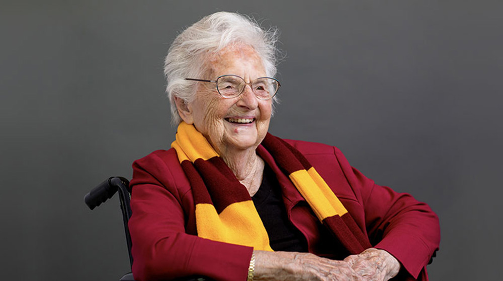 A portrait of Sister Jean Dolores Schmidt, BVM. She is wearing a maroon blazer.